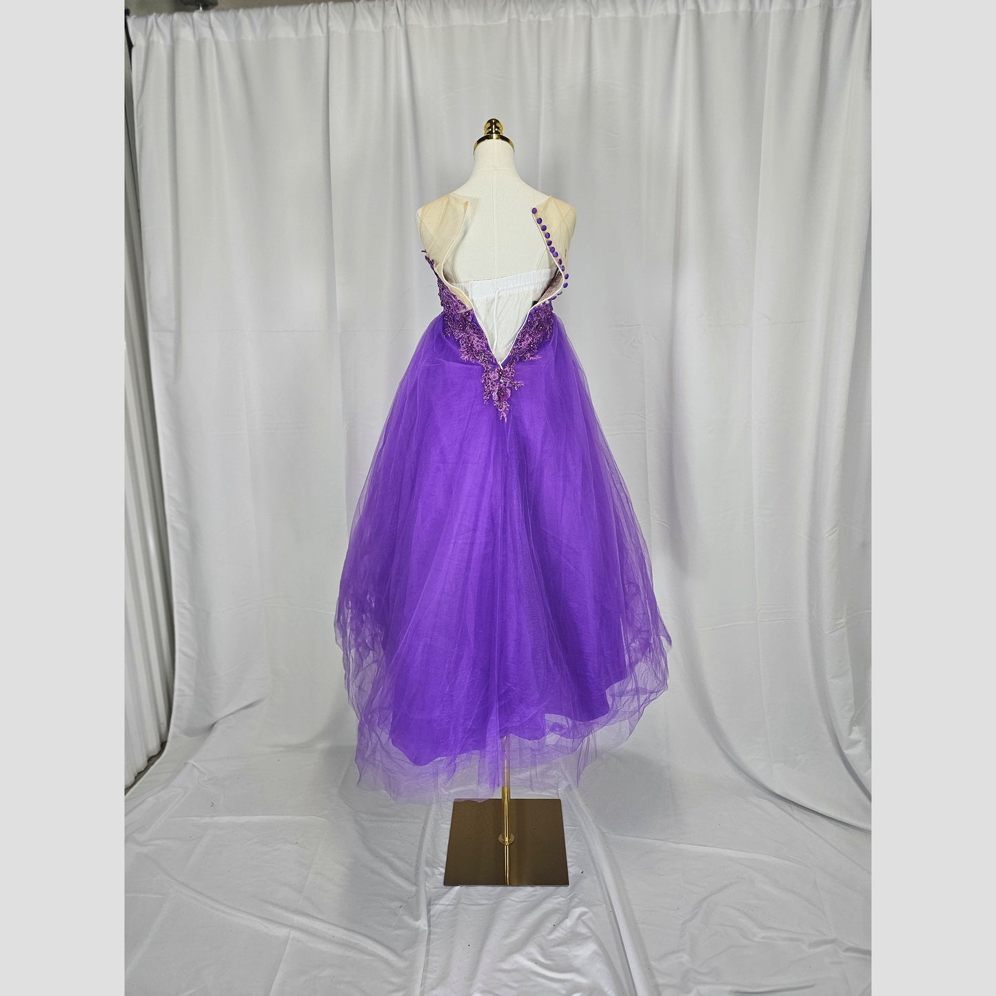 Regal Radiance: Whimsical Purple Gown for Enchanting Occasions