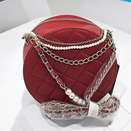 Elegant Round Quilted Handbag with Pearl and Chain Detail