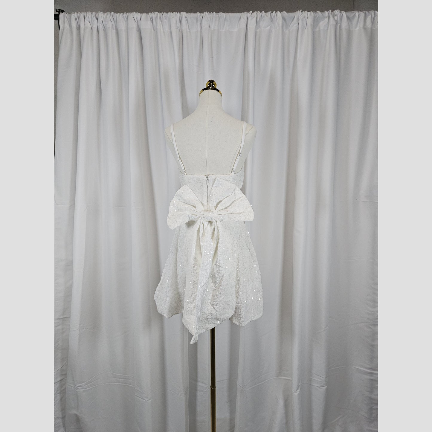 Sparkle & Shine: The Dazzling Little White Dress