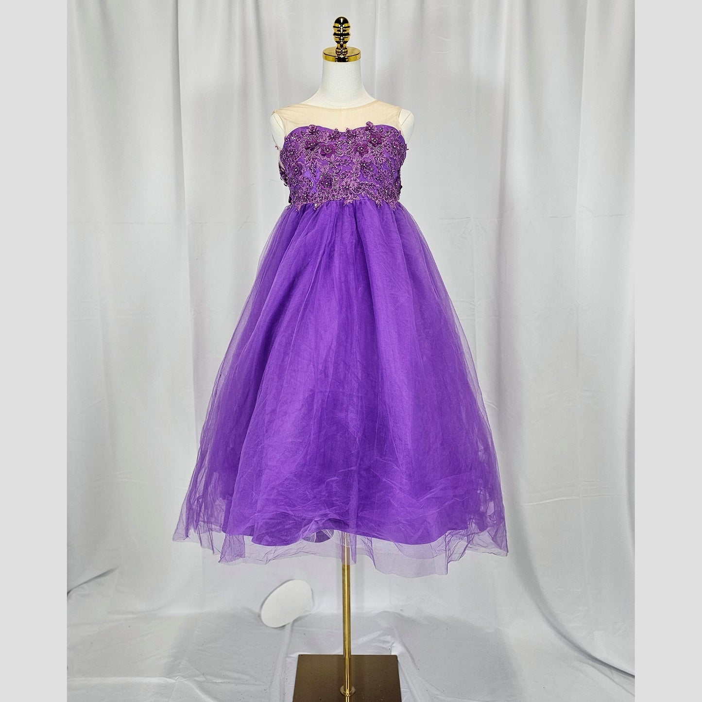 Regal Radiance: Whimsical Purple Gown for Enchanting Occasions