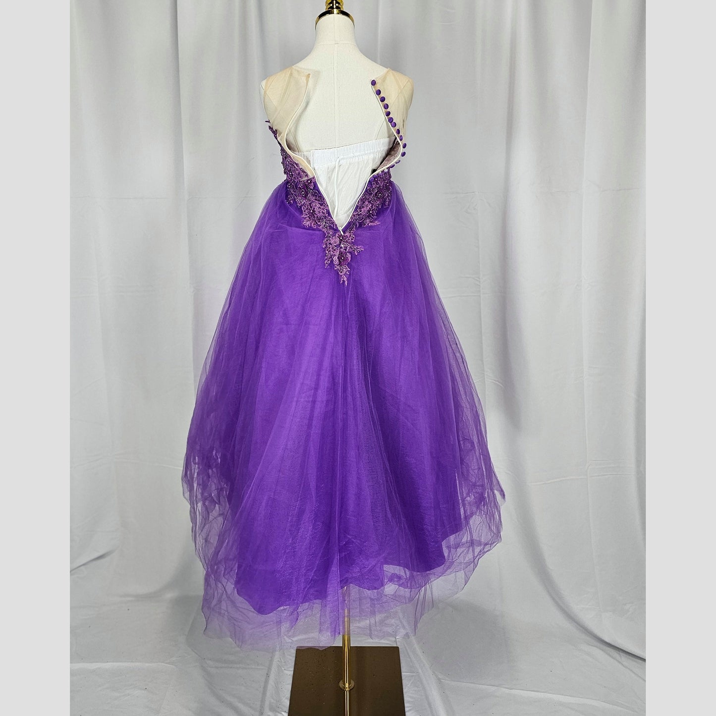 Regal Radiance: Whimsical Purple Gown for Enchanting Occasions
