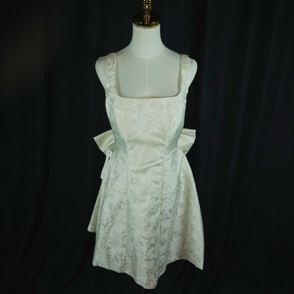 Whimsical Charm: The Bow-tiful Party Dress