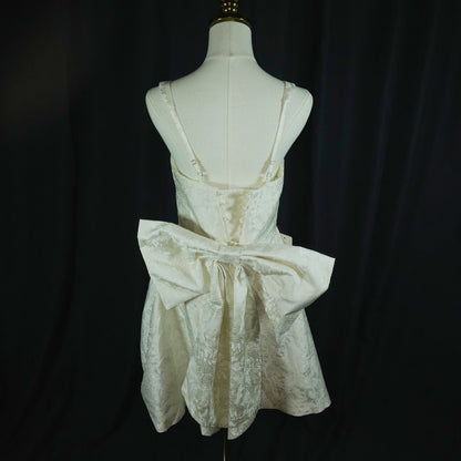 Whimsical Charm: The Bow-tiful Party Dress