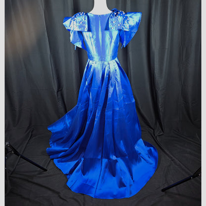 Royal Dynamics: Sapphire Ball Gown with Dramatic Flair