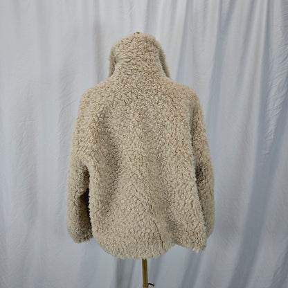 Bold Tan Reversible Shearling Jacket: Fierce Winter Warmth