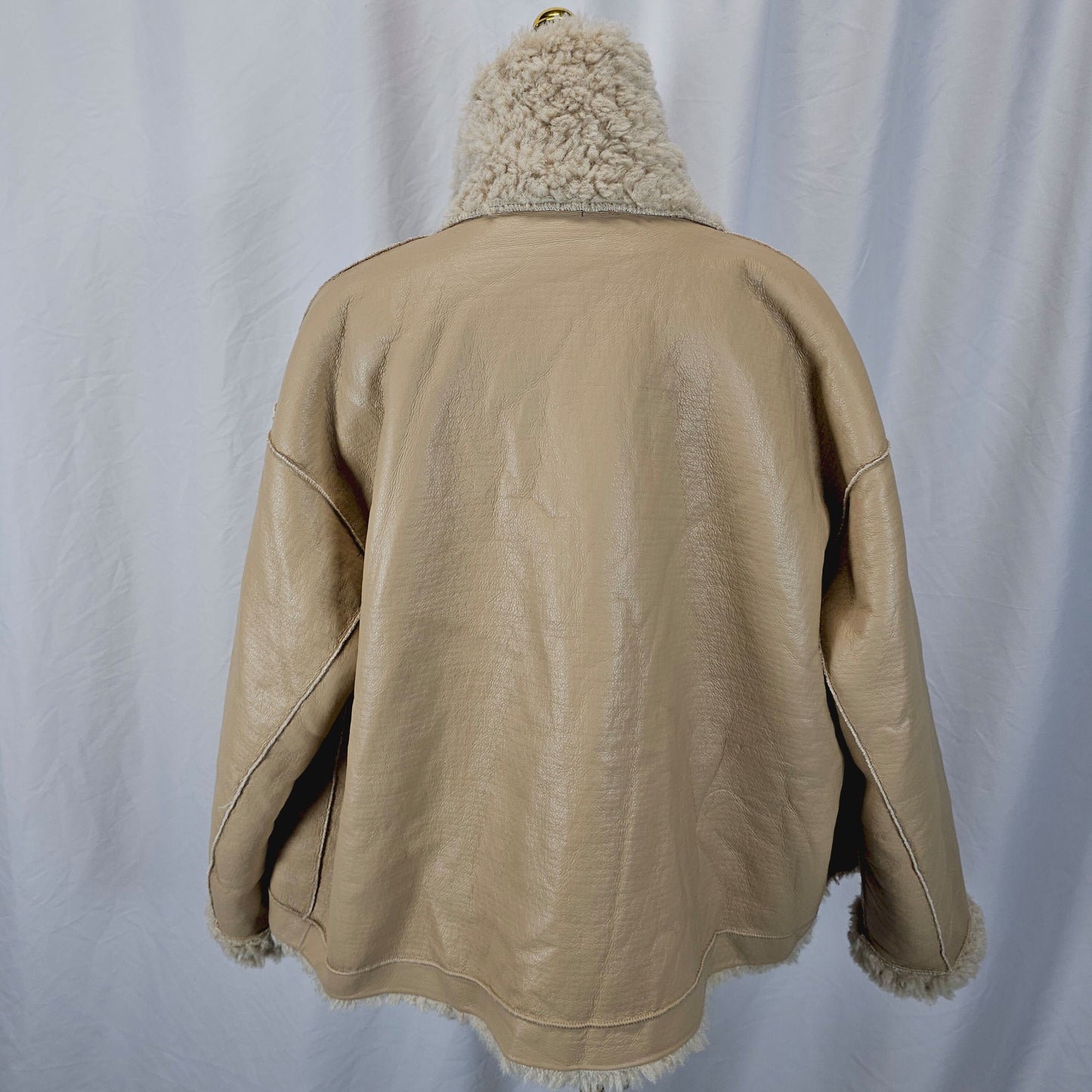 Bold Tan Reversible Shearling Jacket: Fierce Winter Warmth