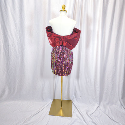 Dazzling Sequin Mini Dress with Bold Burgundy Bow