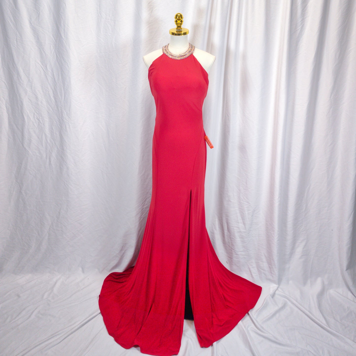 Show-Stopping Red Gown with Daring Neckline for Bold Nights
