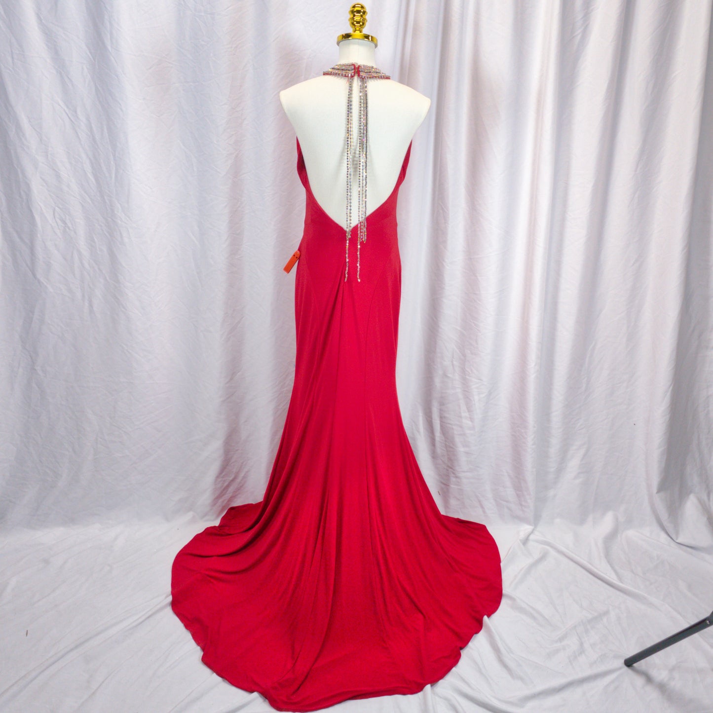 Show-Stopping Red Gown with Daring Neckline for Bold Nights