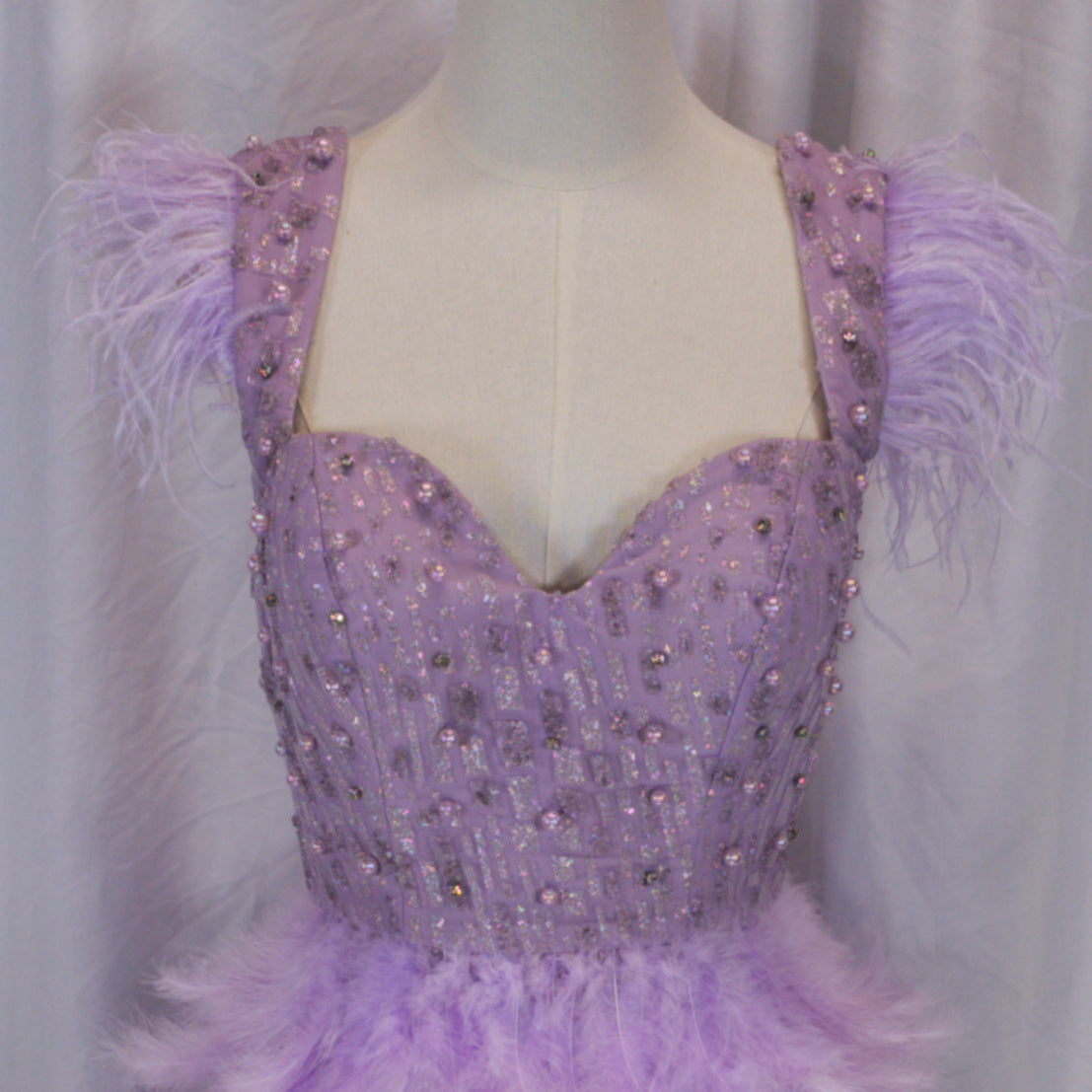 Radiant Lilac Feathered Fantasy Dress for Dazzling Entrances
