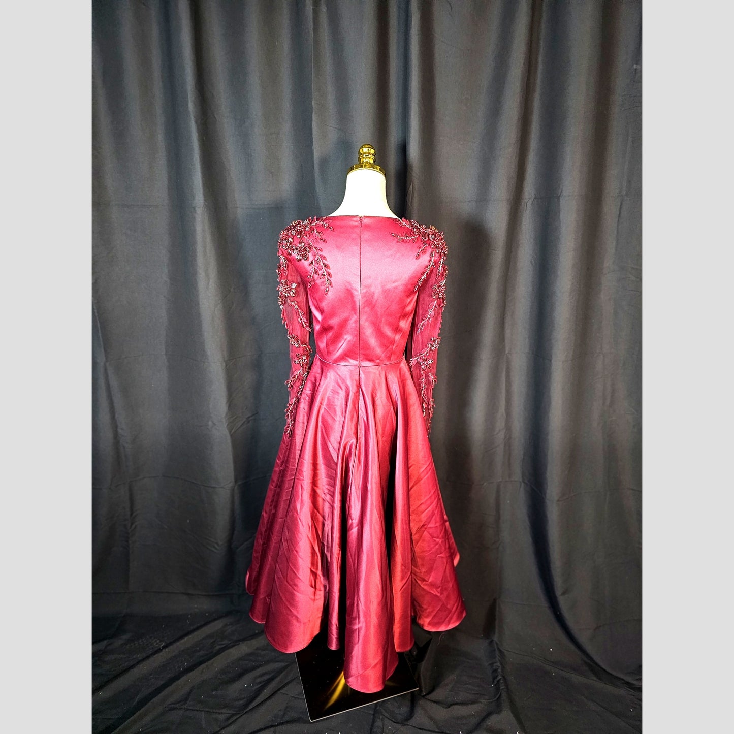 Garnet Gown: A Slice of Glamour with a Side of Drama