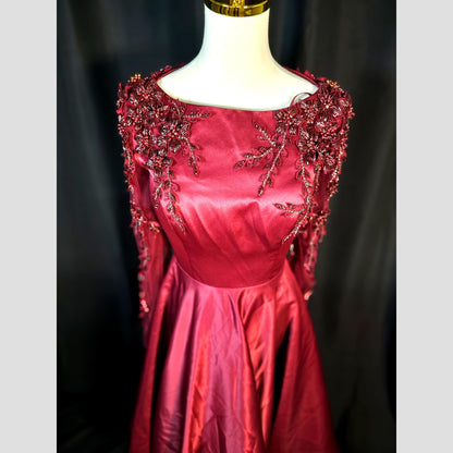 Garnet Gown: A Slice of Glamour with a Side of Drama