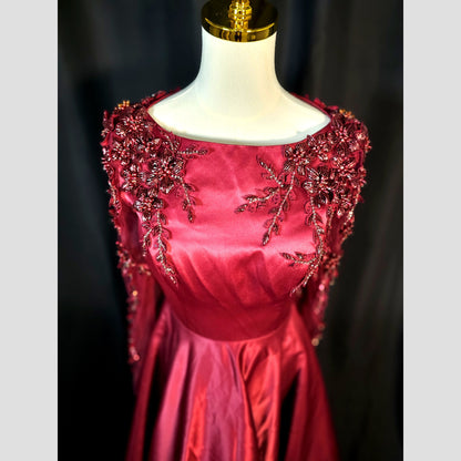 Garnet Gown: A Slice of Glamour with a Side of Drama