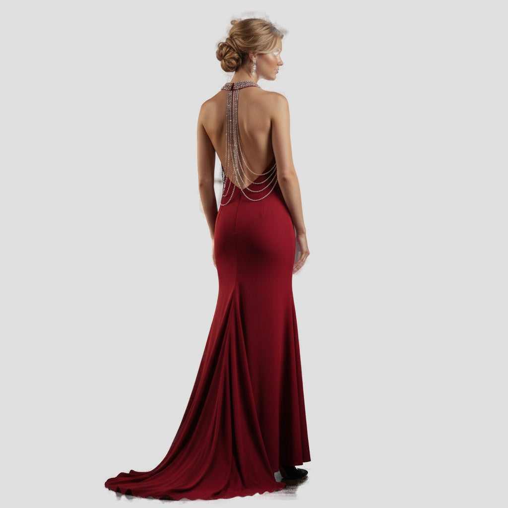 Show-Stopping Red Gown with Daring Neckline for Bold Nights