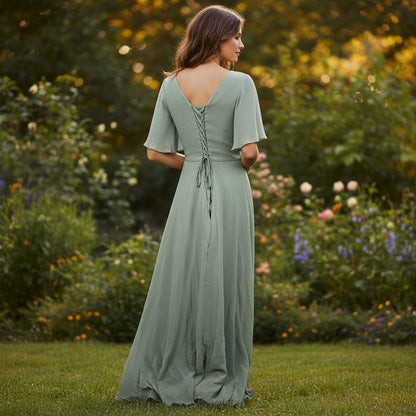 Elegant Mint Green Evening Dress with Flowing Sleeves & Embellishment